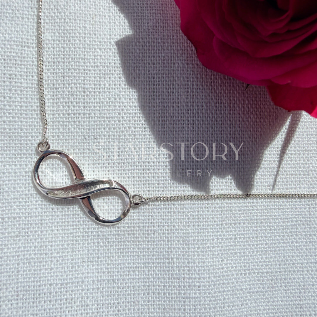 Infinity memorial necklace in sterling silver for ashes hair or fur