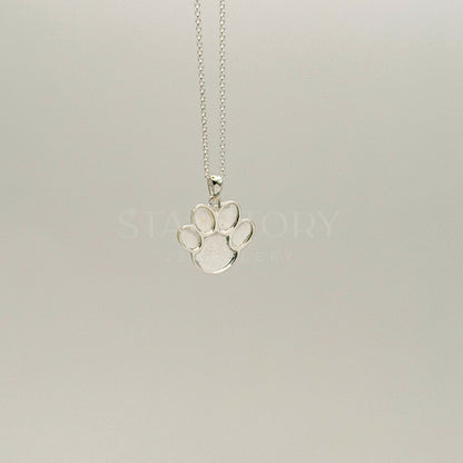 Pawprint Memorial Necklace in sterling silver for ash, hair or fur. 